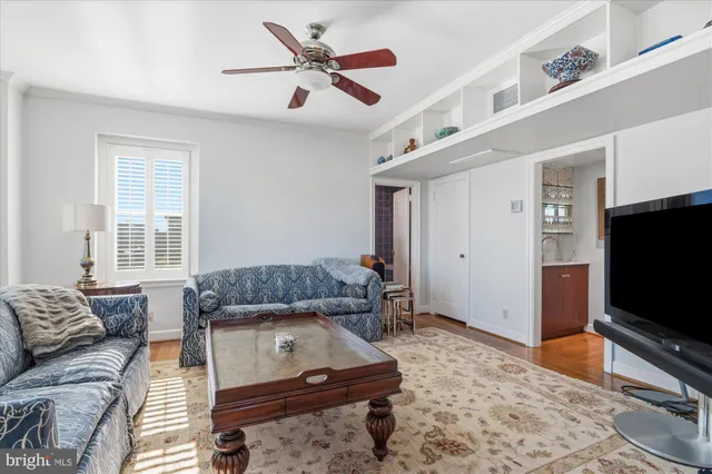 a sink with window and refrigerator