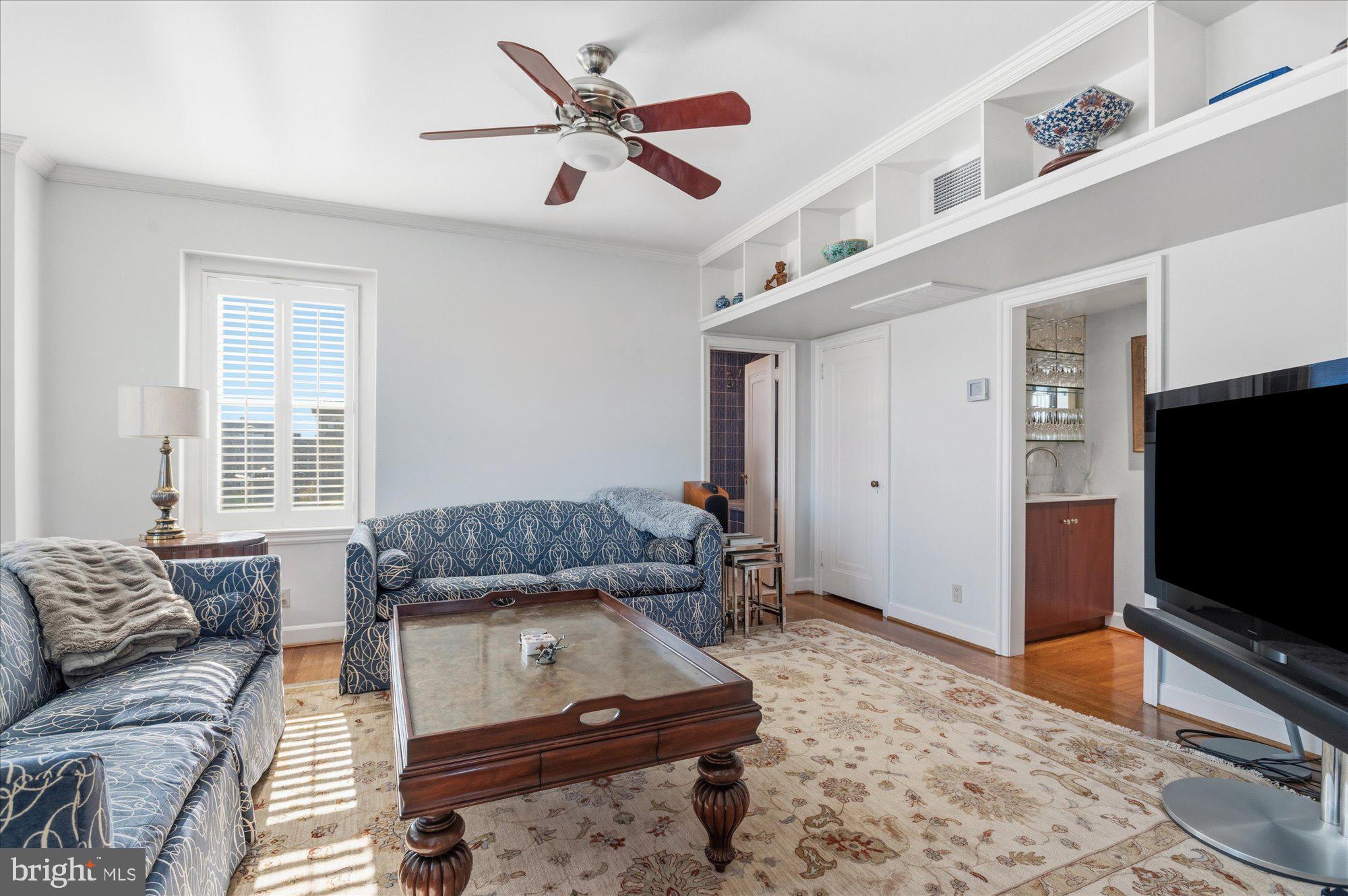 2101 Connecticut Avenue Northwest, Unit 78 Washington, DC 20009 - Photo 30 of 53 a living room with furniture and a flat screen tv