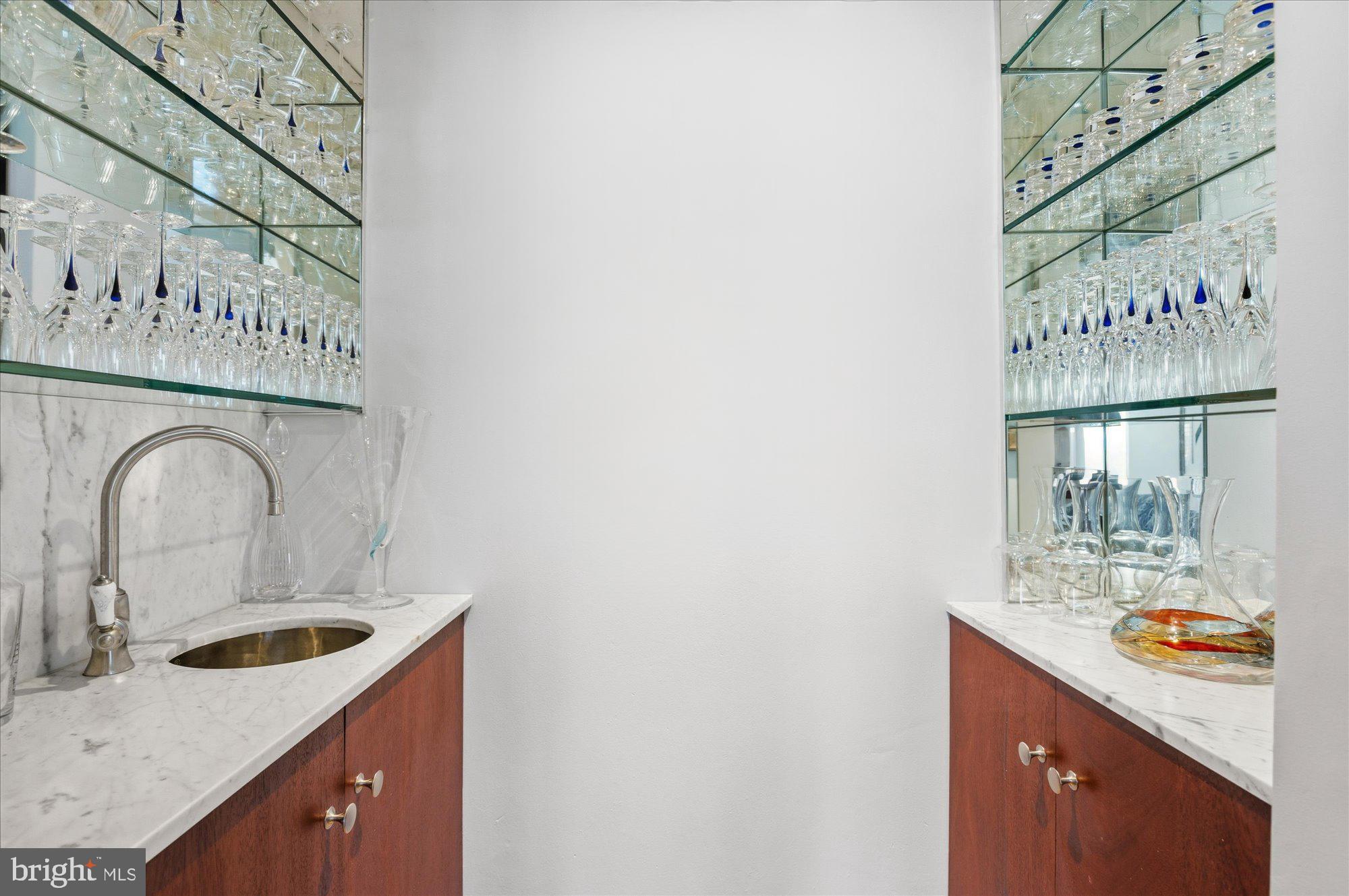 2101 Connecticut Avenue Northwest, Unit 78 Washington, DC 20009 - Photo 32 of 53 a sink with window and refrigerator