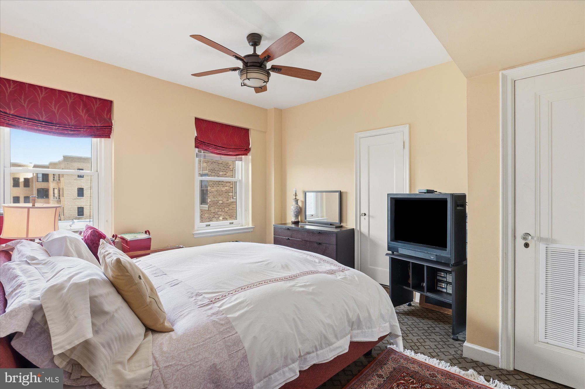 2101 Connecticut Avenue Northwest, Unit 78 Washington, DC 20009 - Photo 35 of 53 a bedroom with a bed and a flat screen tv