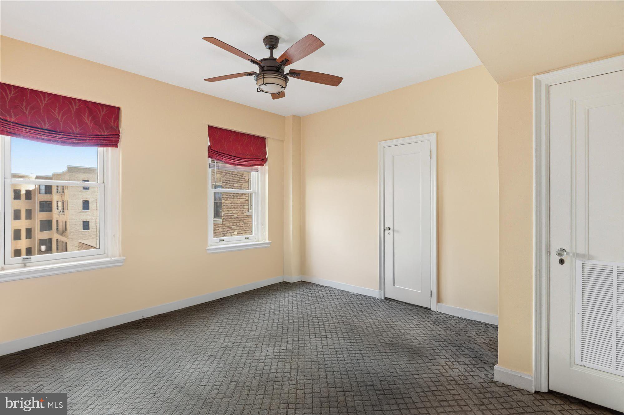 2101 Connecticut Avenue Northwest, Unit 78 Washington, DC 20009 - Photo 36 of 53 a view of a livingroom with a ceiling fan and window
