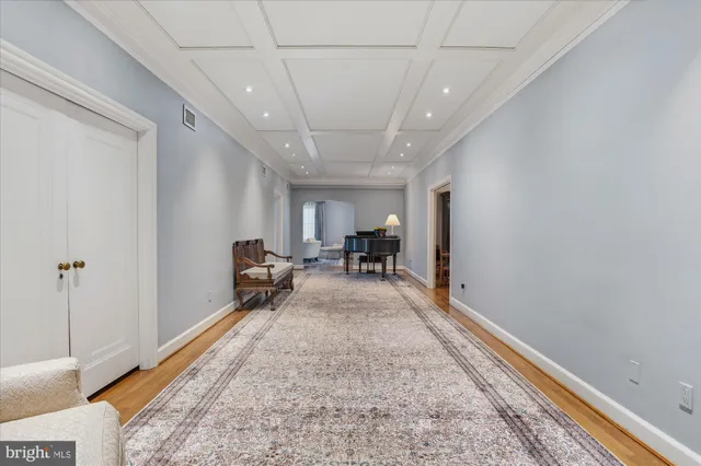 a view of a livingroom with furniture and a rug