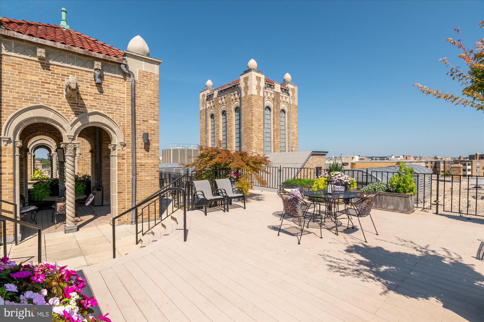 2101 Connecticut Avenue Northwest, Unit 78 Washington, DC 20009 - Photo 45 of 53 a building outdoor space with patio furniture and potted plants