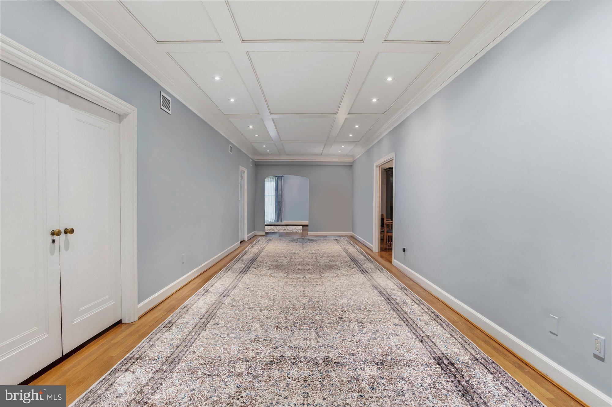 2101 Connecticut Avenue Northwest, Unit 78 Washington, DC 20009 - Photo 5 of 53 a view of a hallway with a chandelier