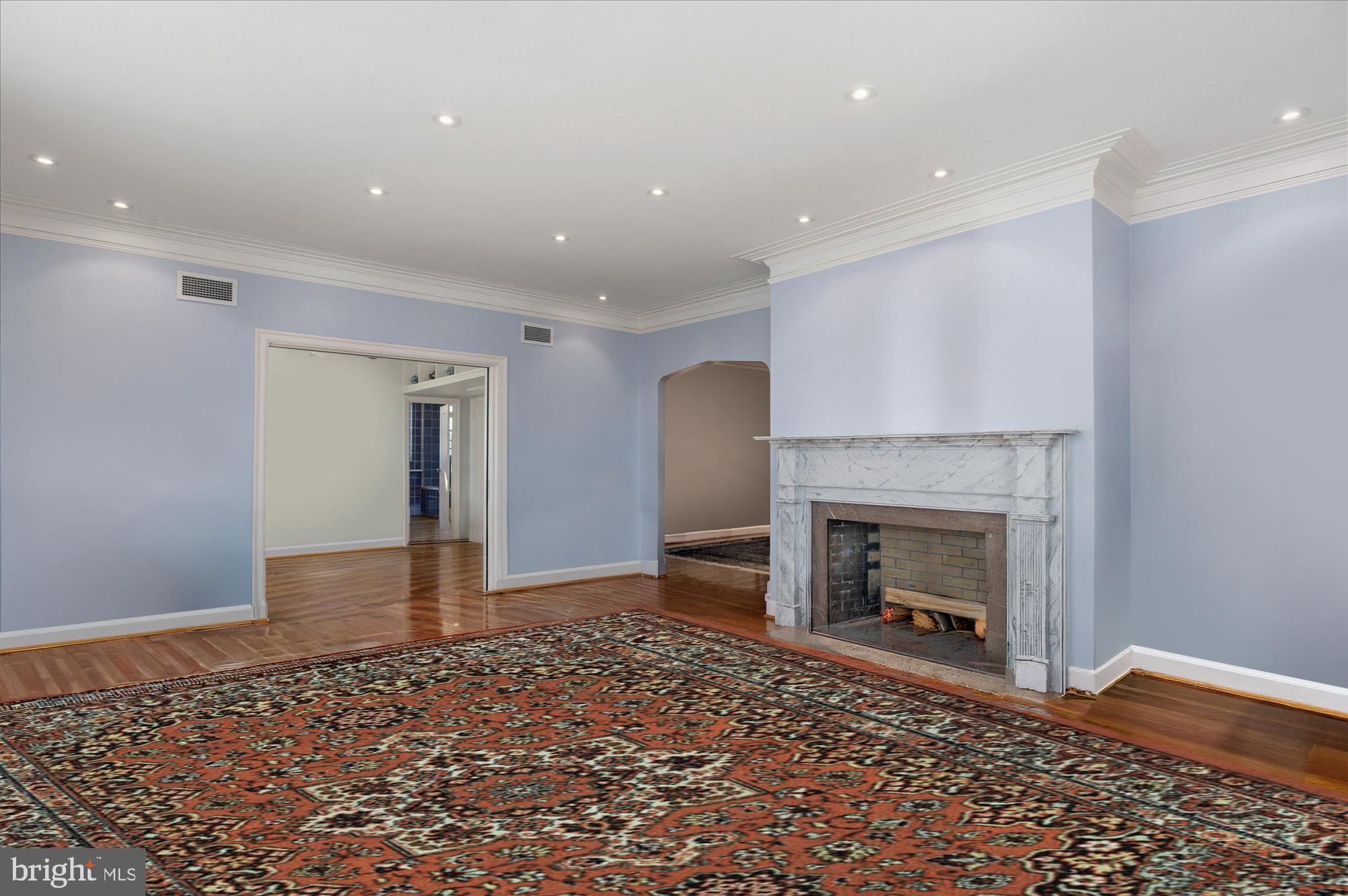 2101 Connecticut Avenue Northwest, Unit 78 Washington, DC 20009 - Photo 8 of 53 a living room with a fireplace