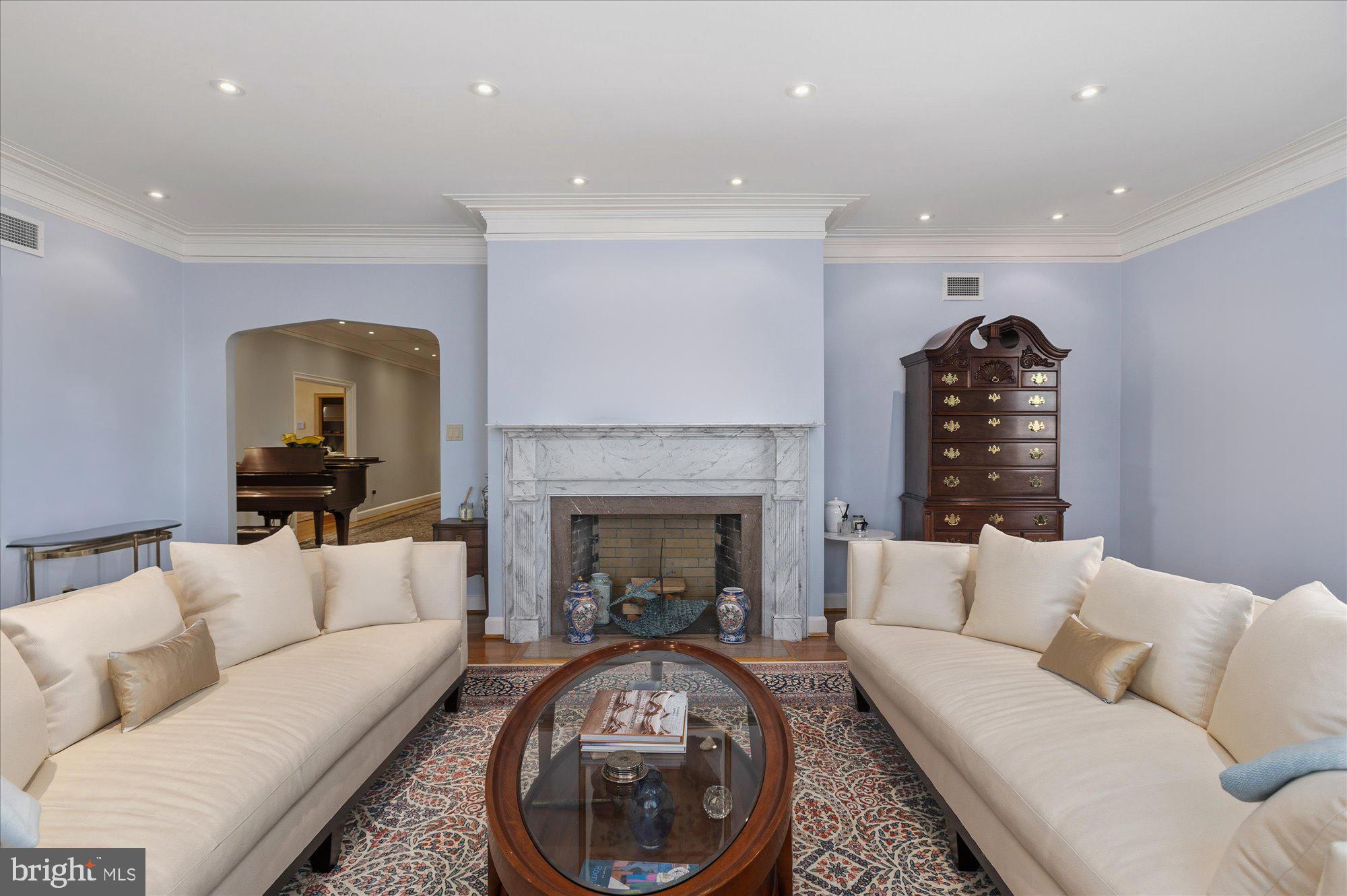 2101 Connecticut Avenue Northwest, Unit 78 Washington, DC 20009 - Photo 9 of 53 a living room with furniture and a fireplace