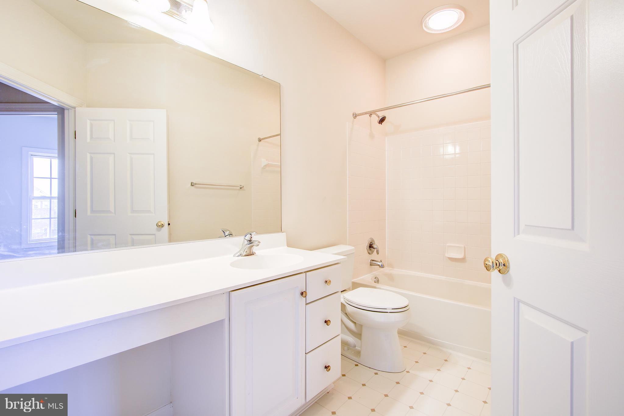 20 Rockingham Court Germantown, MD 20874 - Photo 21 of 30 Hall bathroom with new toilet