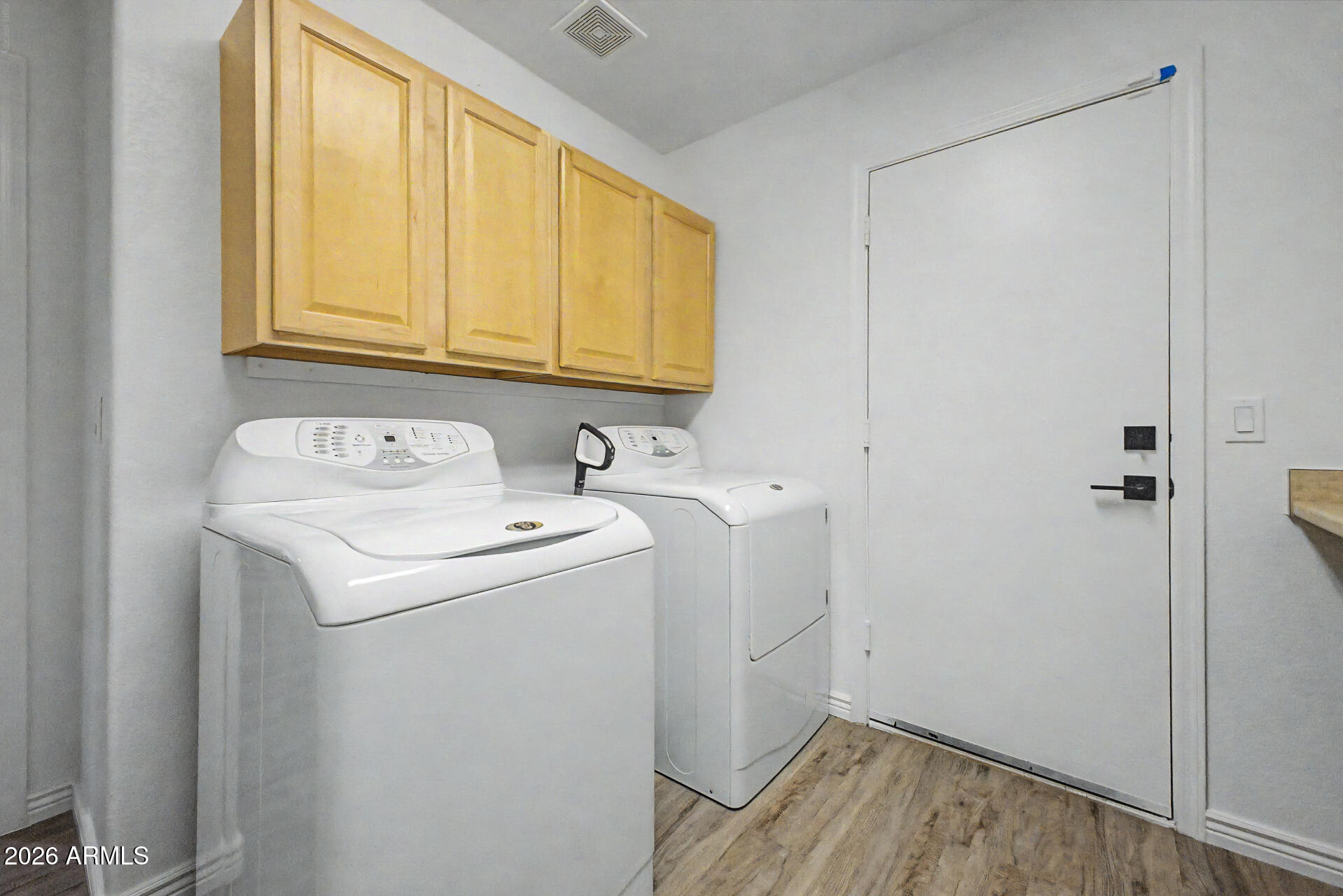 9581 West Ruth Avenue Peoria, AZ 85345 - Photo 23 of 41 Laundry Room w/cabinets