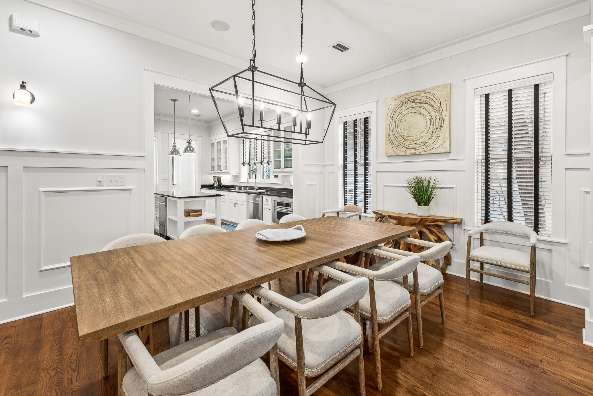 30 North Shingle Lane Watersound, FL 32461 - Photo 14 of 45 a view of a dining room with furniture window and wooden floor