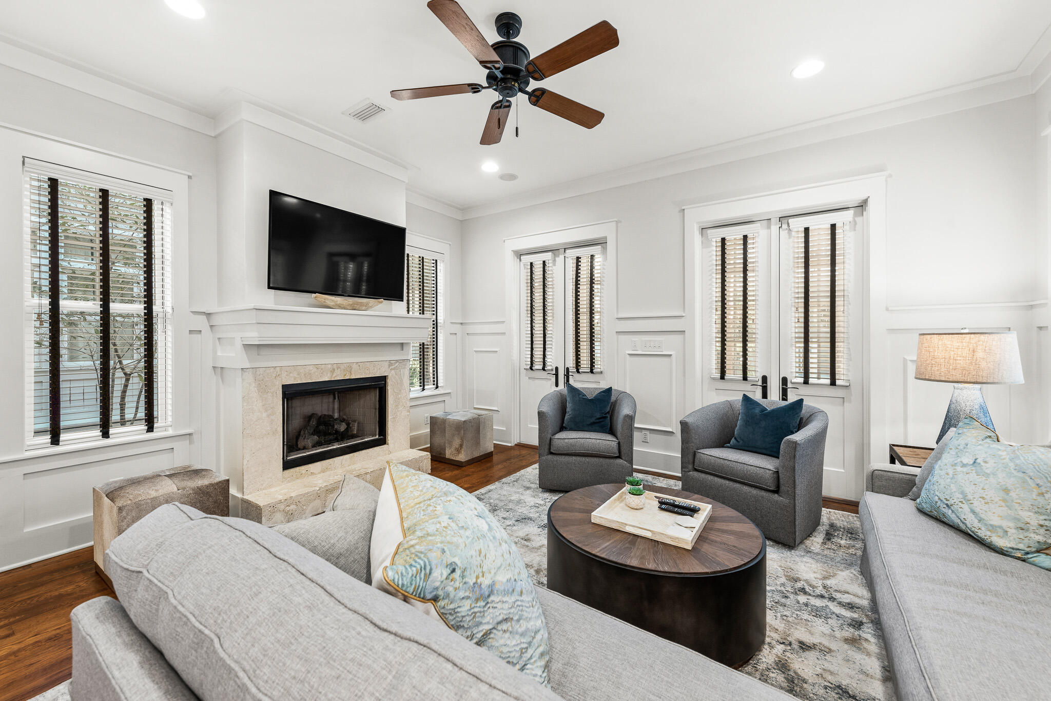30 North Shingle Lane Watersound, FL 32461 - Photo 16 of 45 a living room with furniture fireplace and a flat screen tv