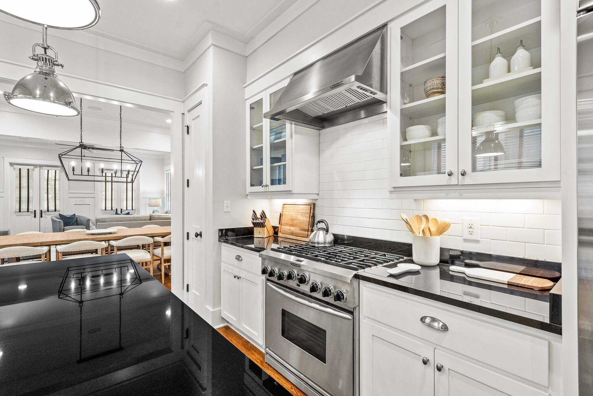 30 North Shingle Lane Watersound, FL 32461 - Photo 19 of 45 a kitchen with stainless steel appliances granite countertop a stove and a sink