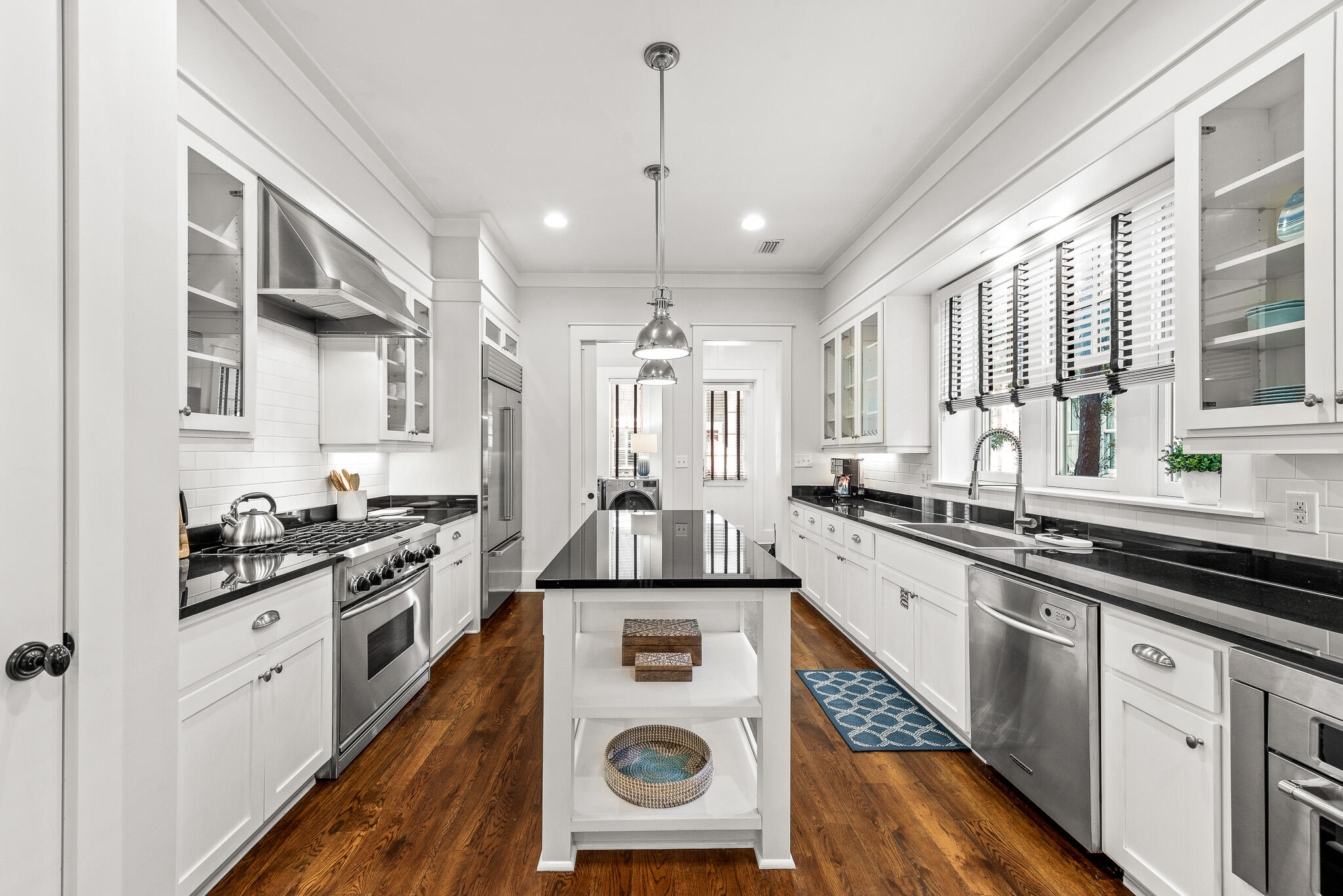 30 North Shingle Lane Watersound, FL 32461 - Photo 21 of 45 a kitchen with a stove a sink and a refrigerator