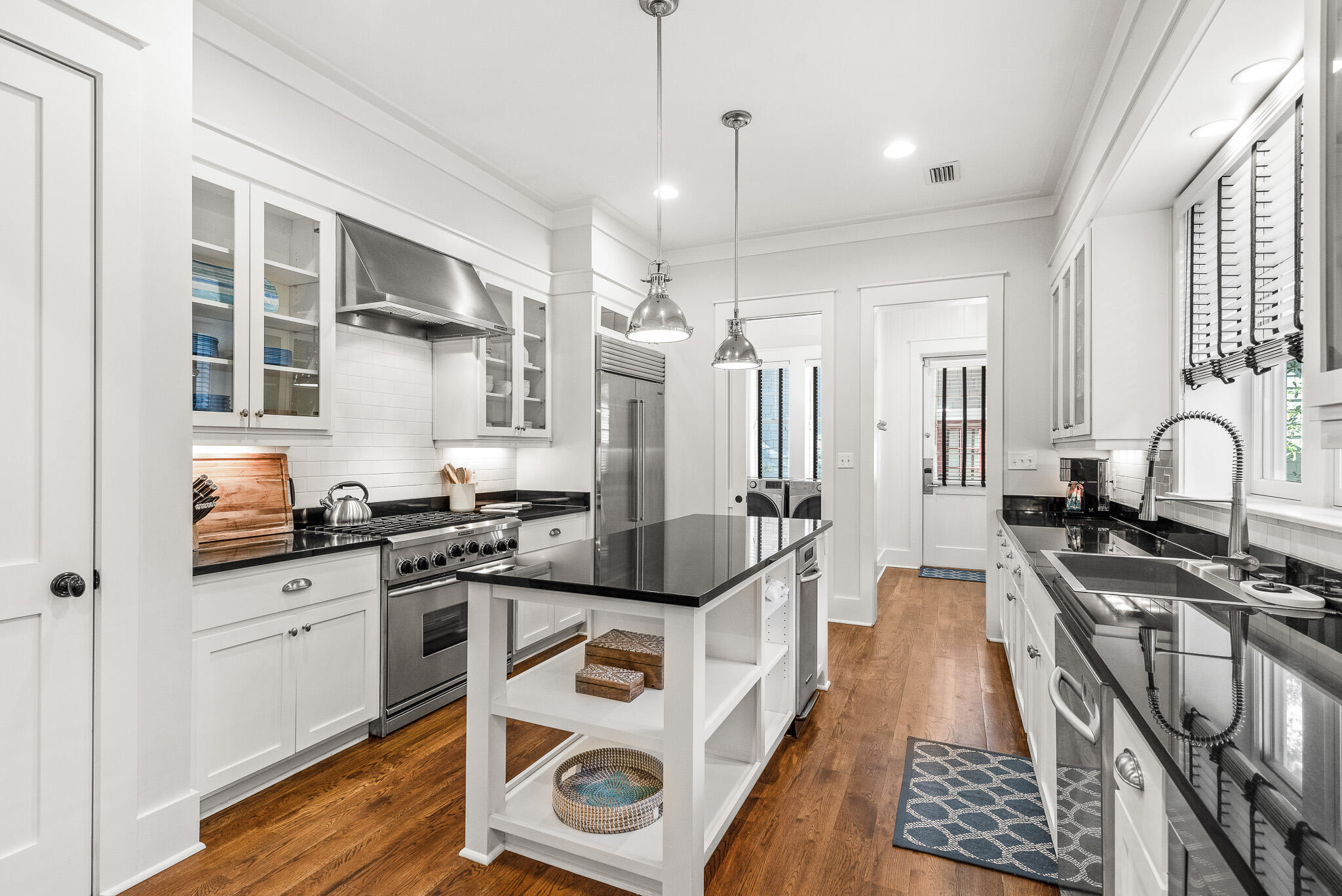 30 North Shingle Lane Watersound, FL 32461 - Photo 22 of 45 a kitchen with stainless steel appliances a stove a sink and a refrigerator