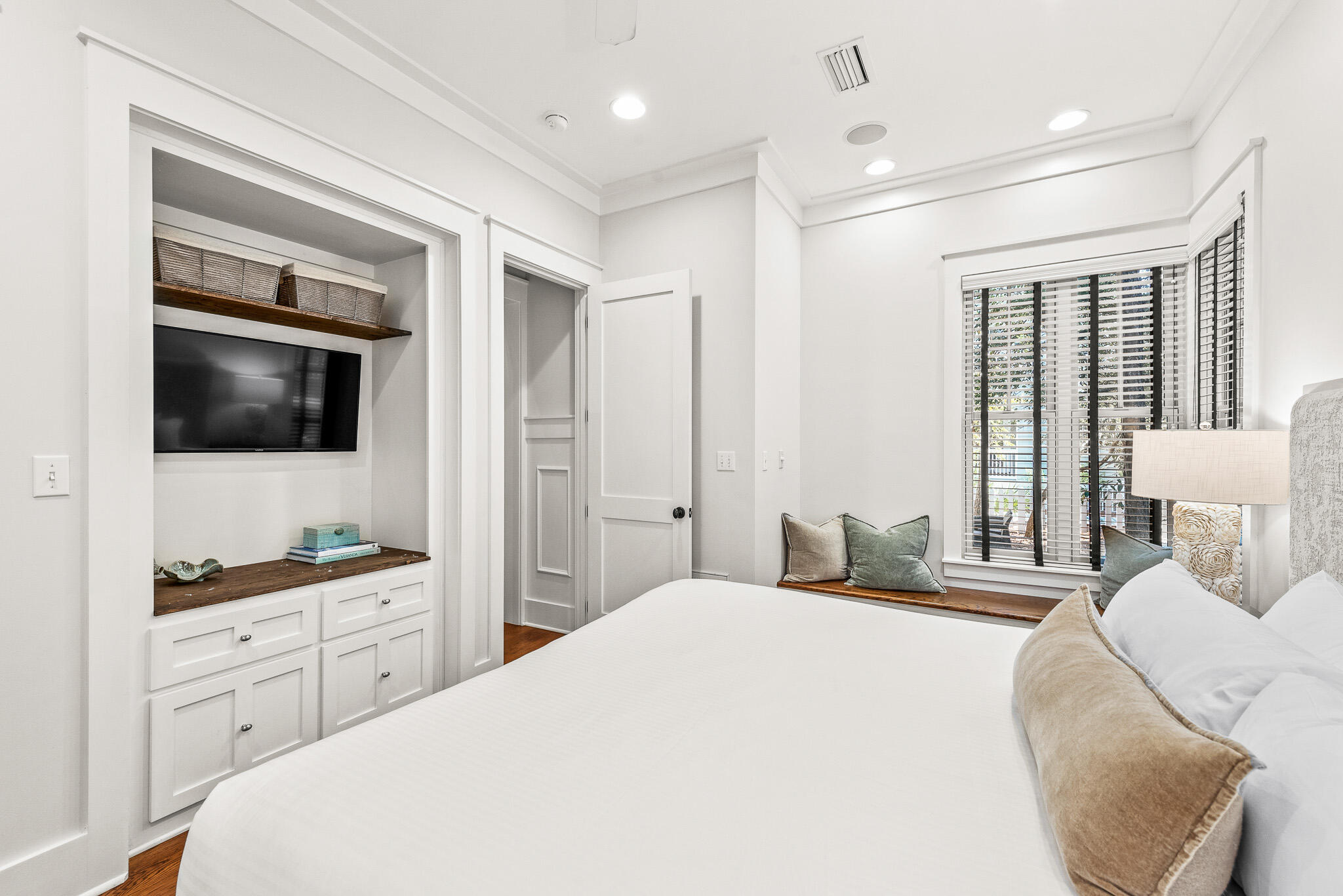 30 North Shingle Lane Watersound, FL 32461 - Photo 24 of 45 a bedroom with a large bed and a flat screen tv