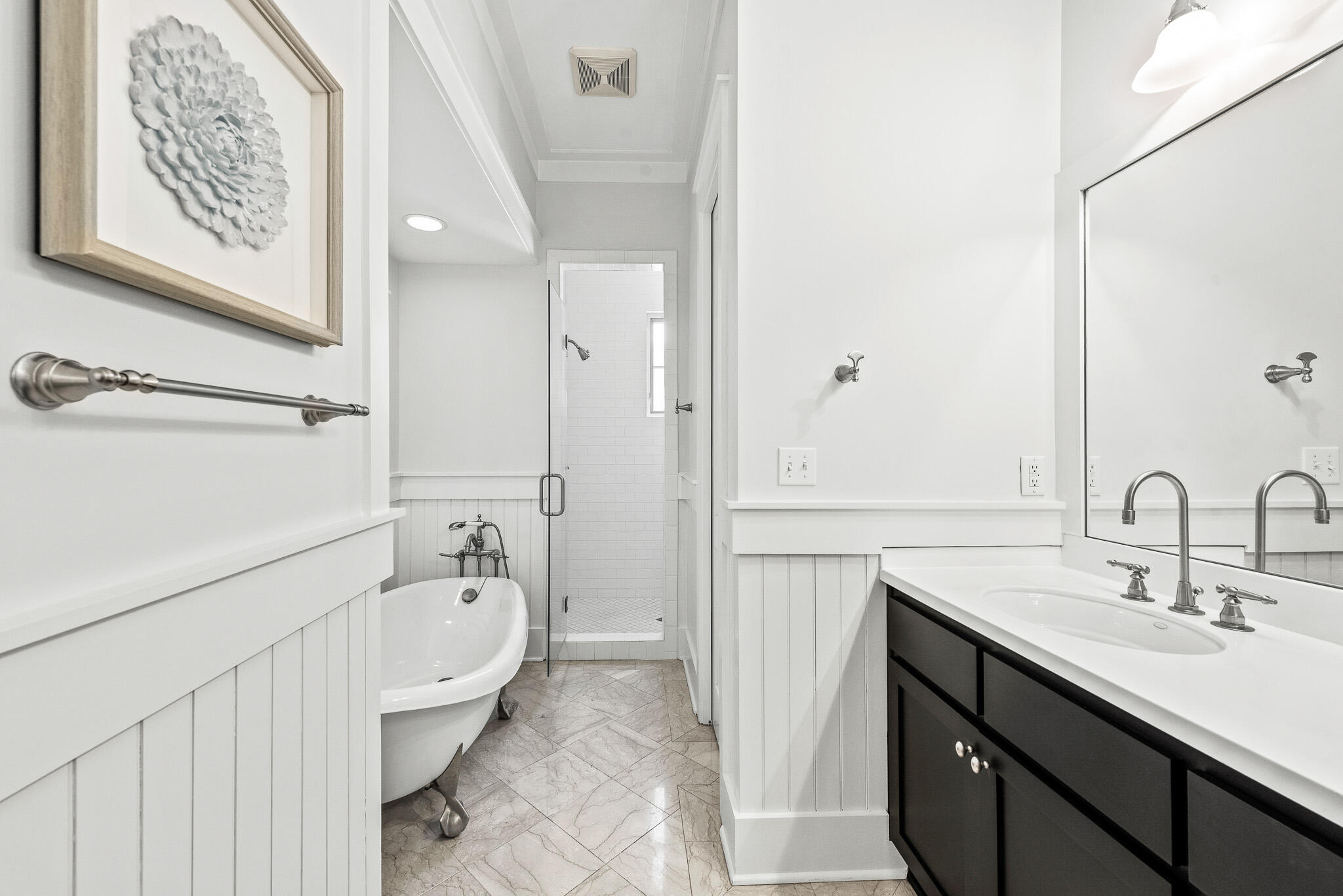 30 North Shingle Lane Watersound, FL 32461 - Photo 26 of 45 a spacious bathroom with a tub sink and mirror