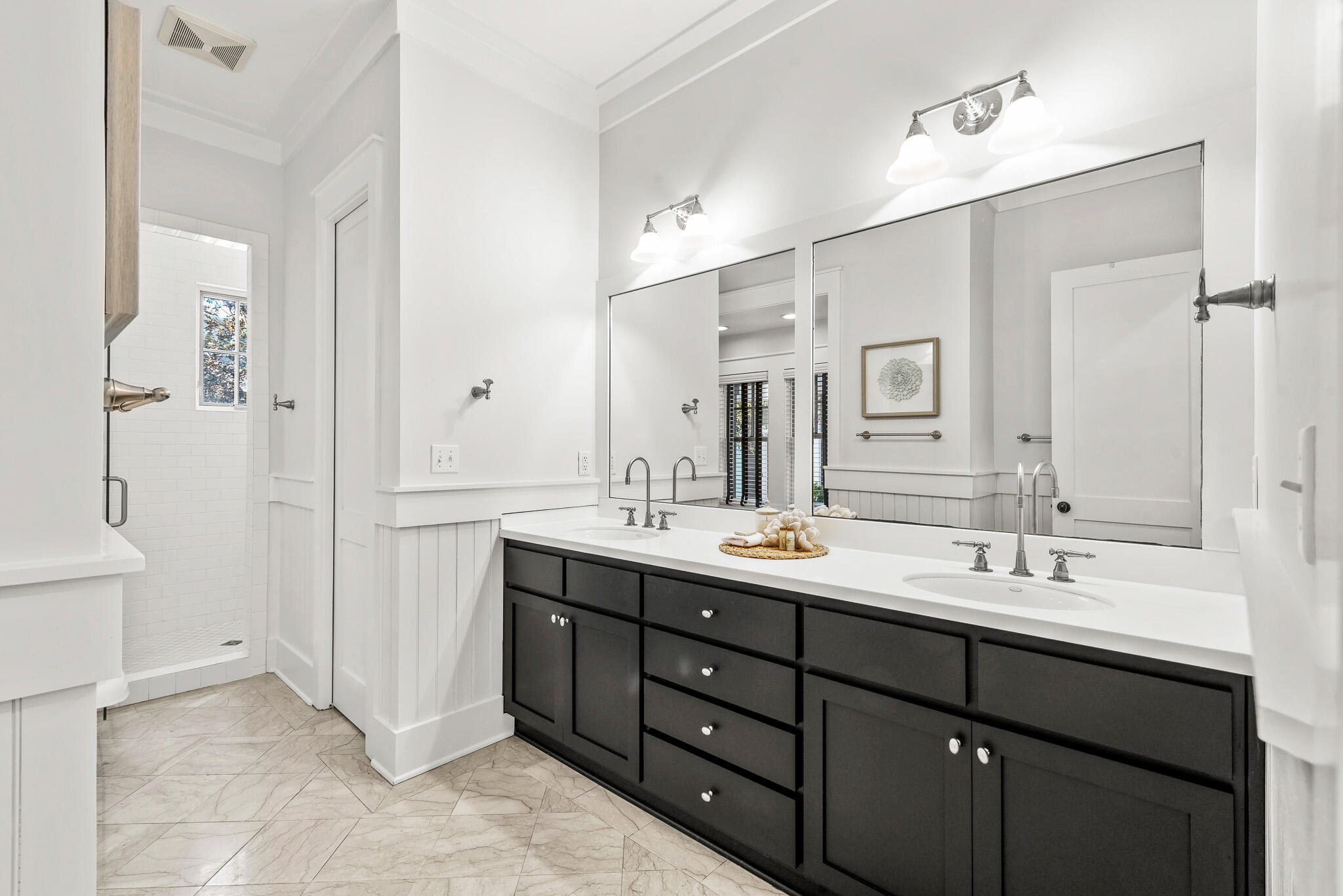 30 North Shingle Lane Watersound, FL 32461 - Photo 27 of 45 a bathroom with a double vanity sink mirror and double