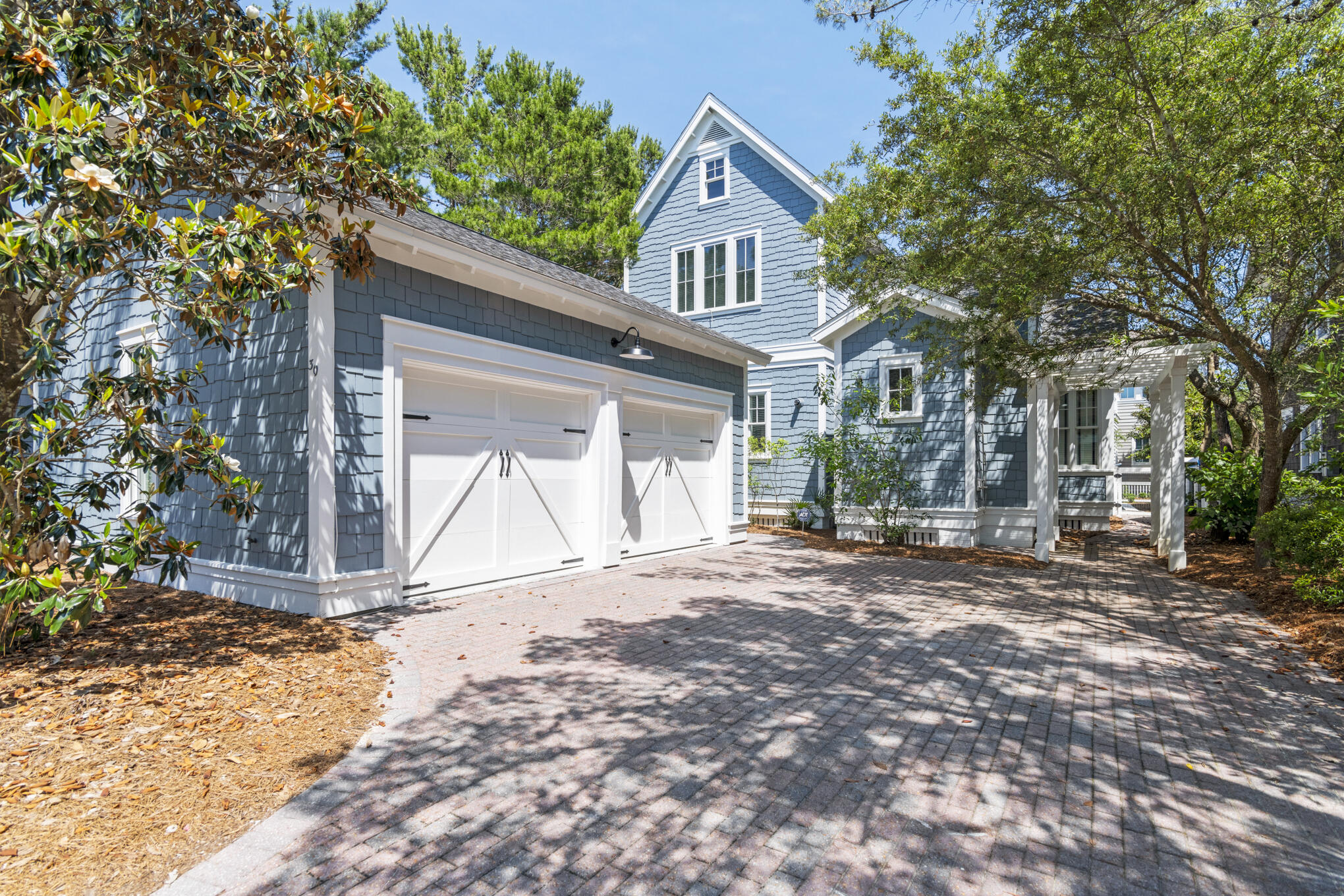 30 North Shingle Lane Watersound, FL 32461 - Photo 3 of 45 a view of a house with a yard and large tree