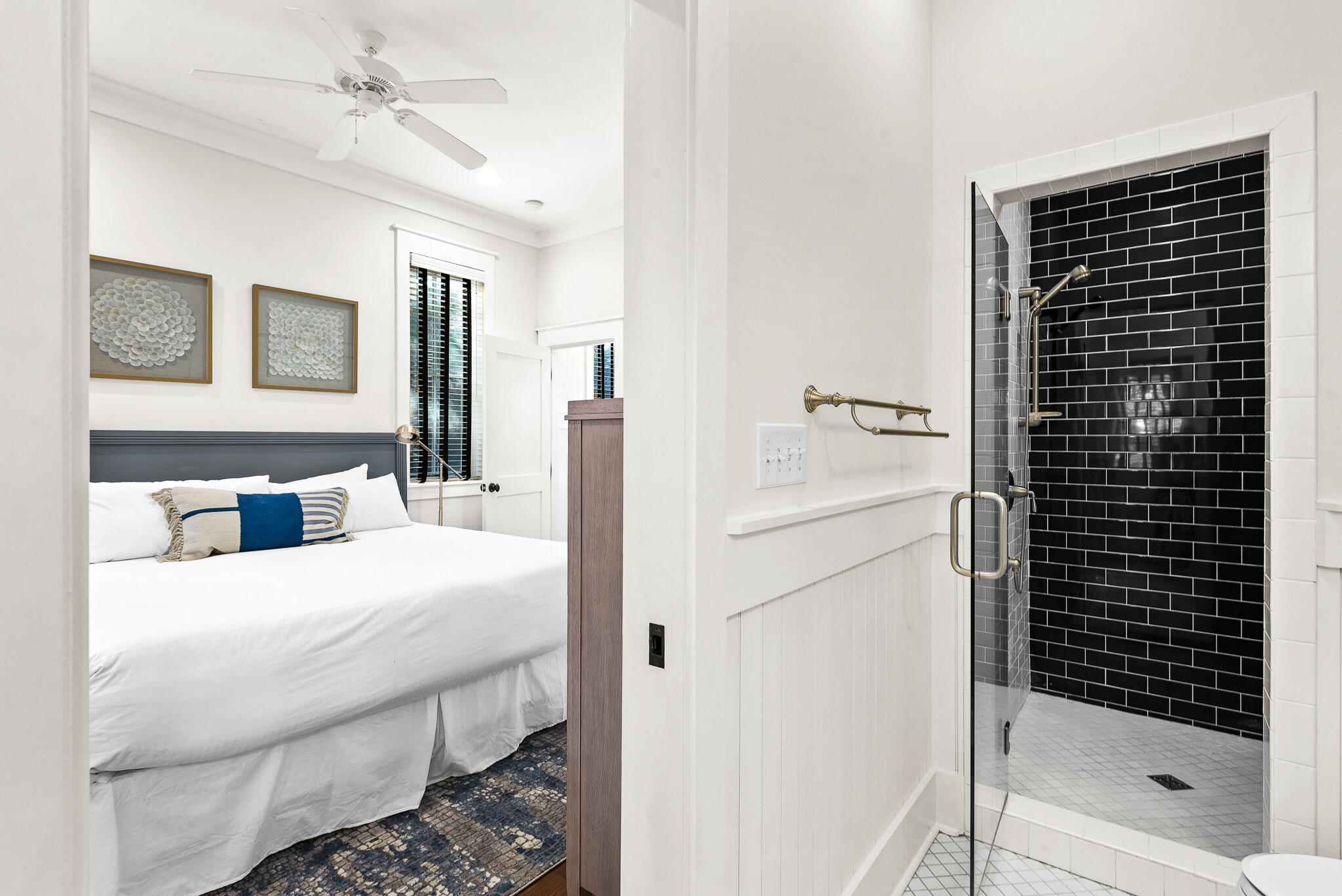 30 North Shingle Lane Watersound, FL 32461 - Photo 34 of 45 a bedroom with a bed and a walk in closet