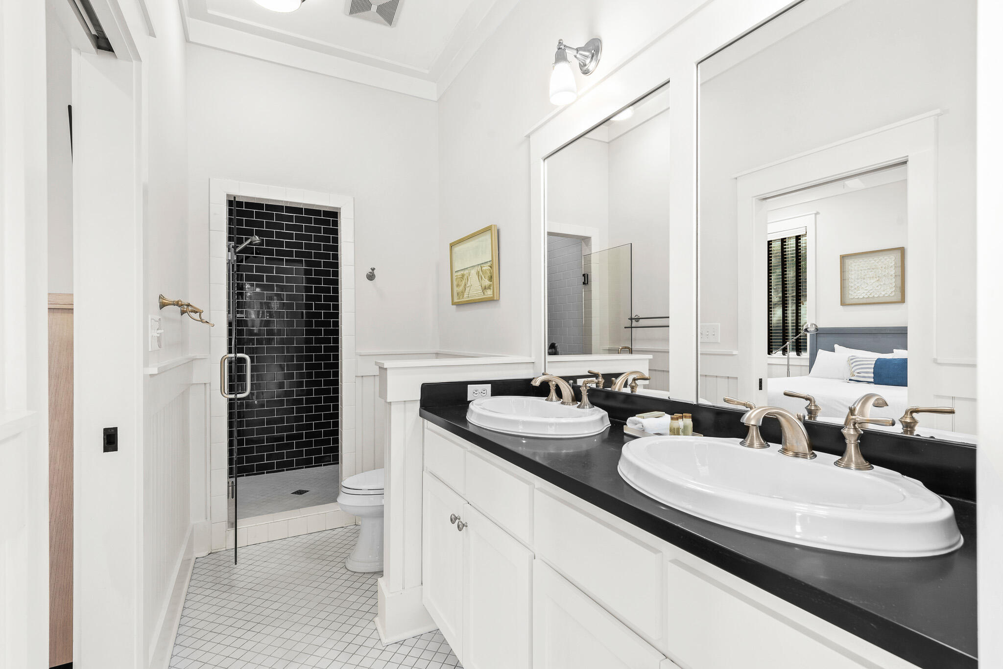 30 North Shingle Lane Watersound, FL 32461 - Photo 35 of 45 a bathroom with a double vanity sink and mirror