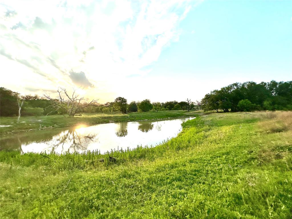 3023 S South Goldthwaite, TX 76844 - Photo 21 of 40 a view of a lake with a big yard