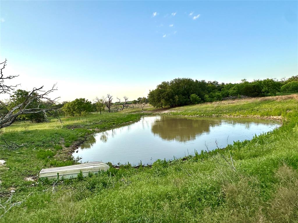 3023 S South Goldthwaite, TX 76844 - Photo 25 of 40 a view of a lake from a yard