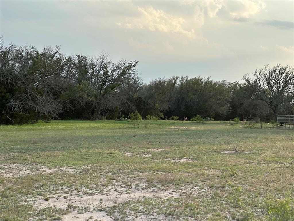 3023 S South Goldthwaite, TX 76844 - Photo 10 of 40 a view of outdoor space with deck and yard