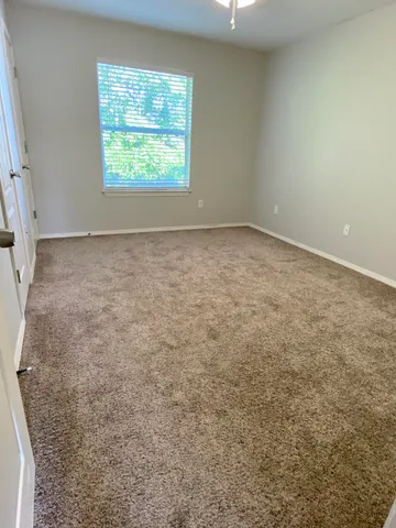 an empty room with a window