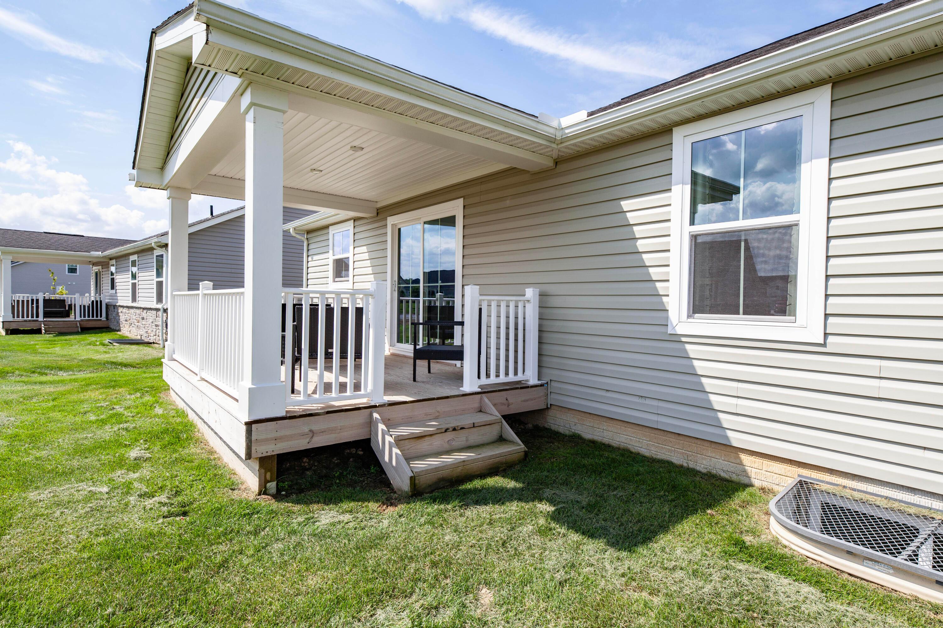 91 Firenze Road Delaware, OH 43015 - Photo 28 of 36 Back Exterior & Covered Porch