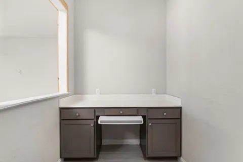 a room with a table and a window