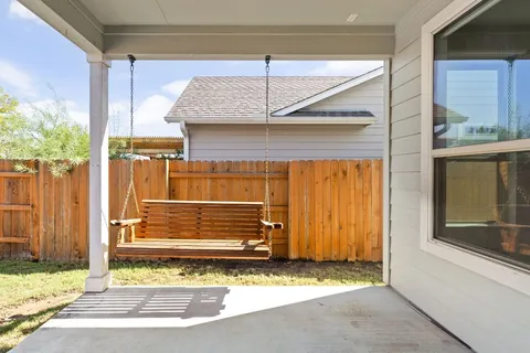 a view of a house with a wooden door