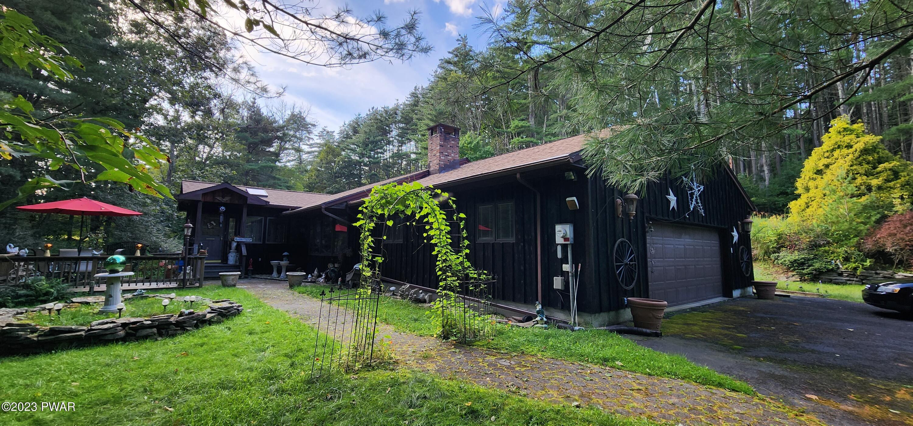 438 Engvaldsen Road Hawley, PA 18428 - Photo 2 of 55 Side view & Garage