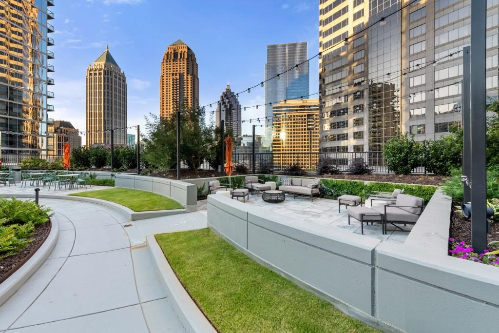 1080 Peachtree Street Northeast, Unit 1906 Atlanta, GA 30309 - Photo 37 of 46 a view of a city with tall buildings