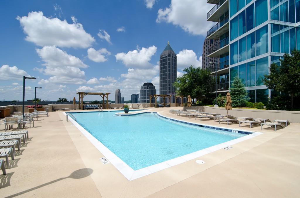 1080 Peachtree Street Northeast, Unit 1906 Atlanta, GA 30309 - Photo 40 of 46 a view of outdoor space with swimming pool and seating