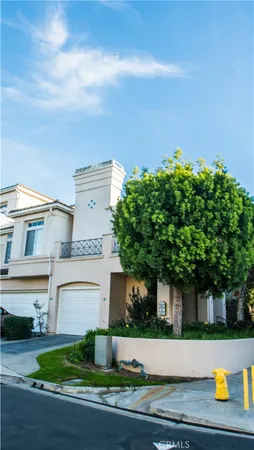 a front view of a house with yard