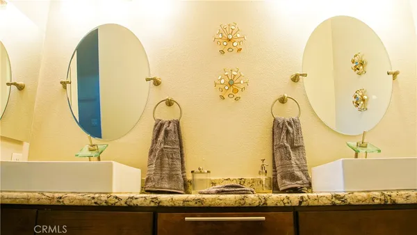 a outdoor sitting area with furniture and wooden floor