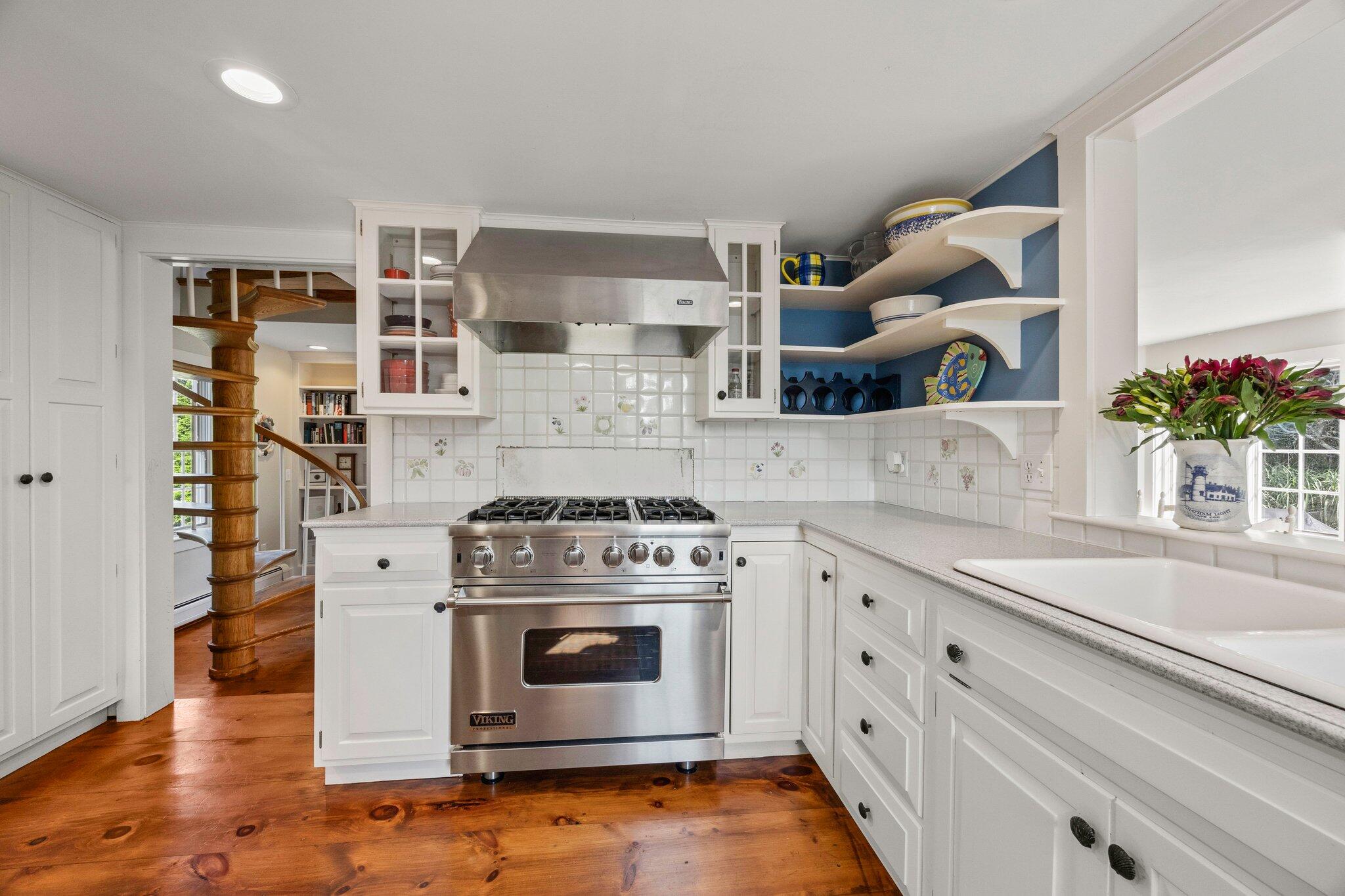 47 Quasson Road Chatham, MA 02633 - Photo 13 of 47 a kitchen with a stove and cabinets