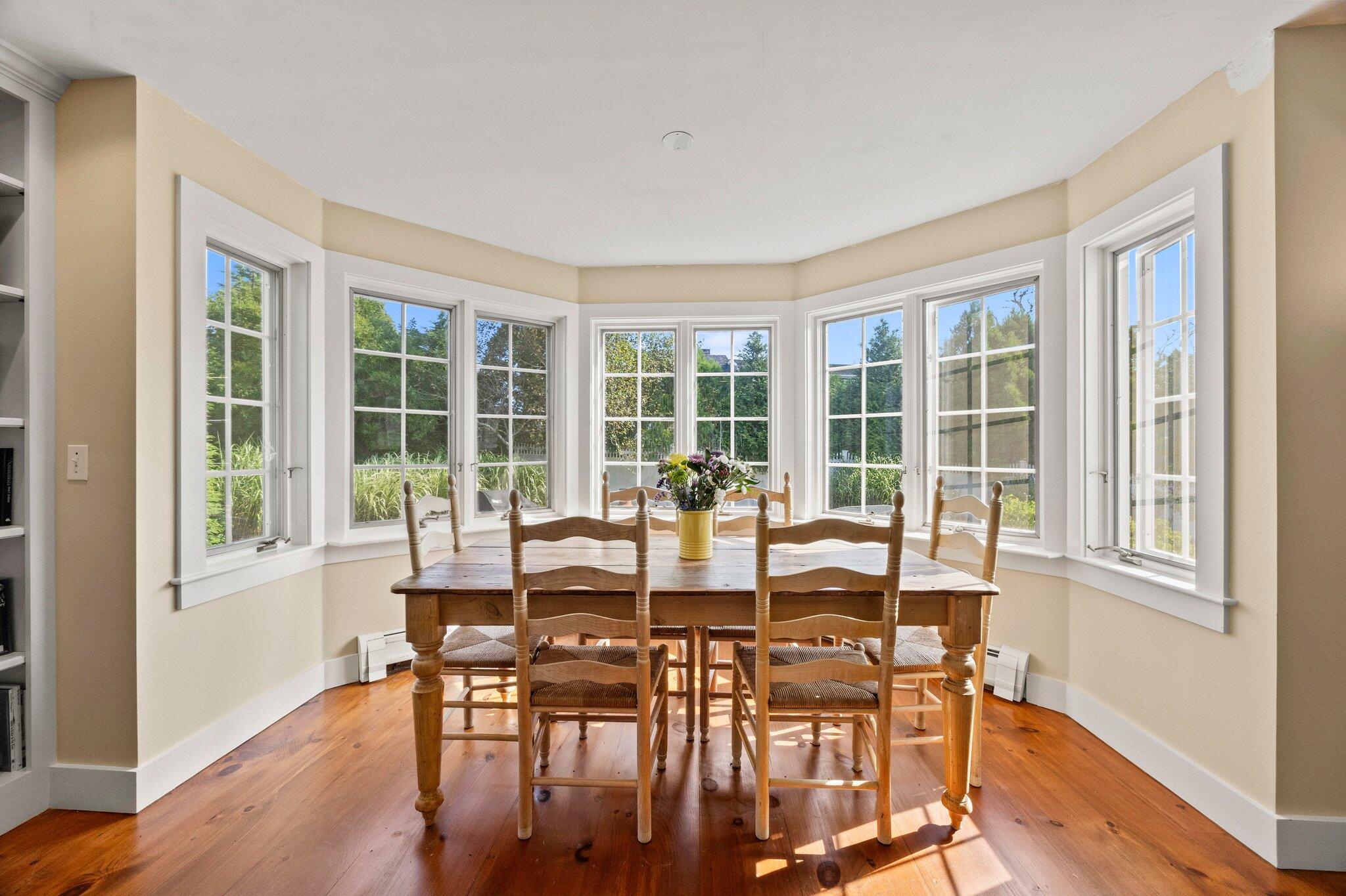 47 Quasson Road Chatham, MA 02633 - Photo 18 of 47 a view of a dining room with furniture window and outside view