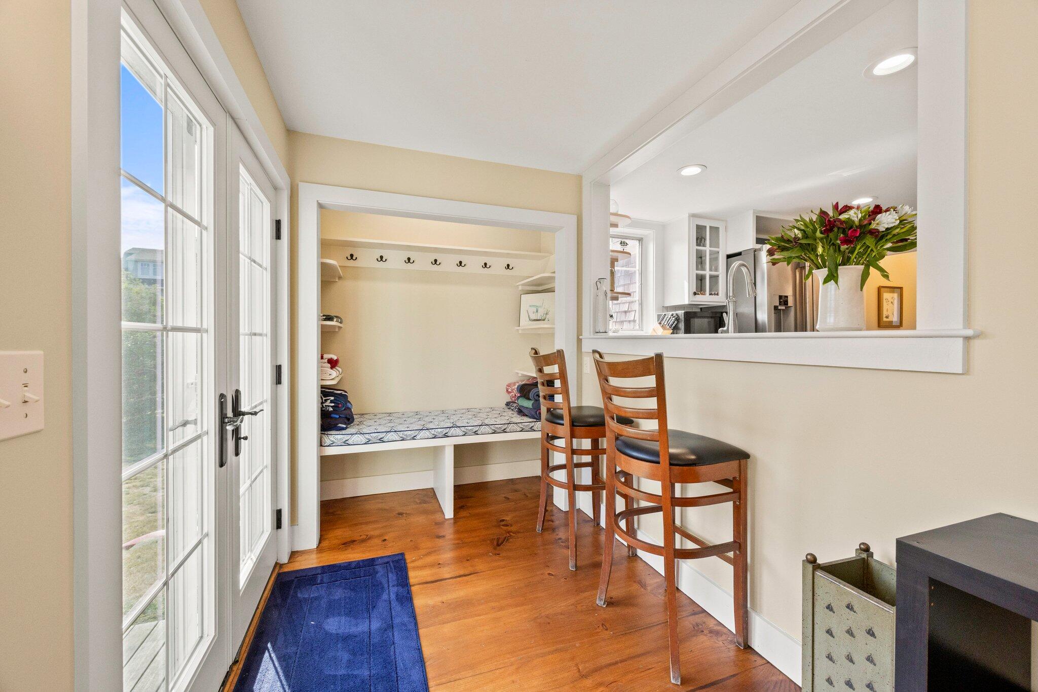 47 Quasson Road Chatham, MA 02633 - Photo 19 of 47 a view of a dining room with furniture and wooden floor