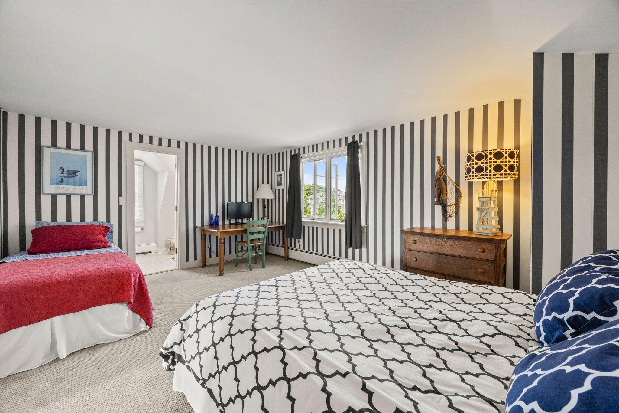 47 Quasson Road Chatham, MA 02633 - Photo 22 of 47 a bedroom with a bed and a large window