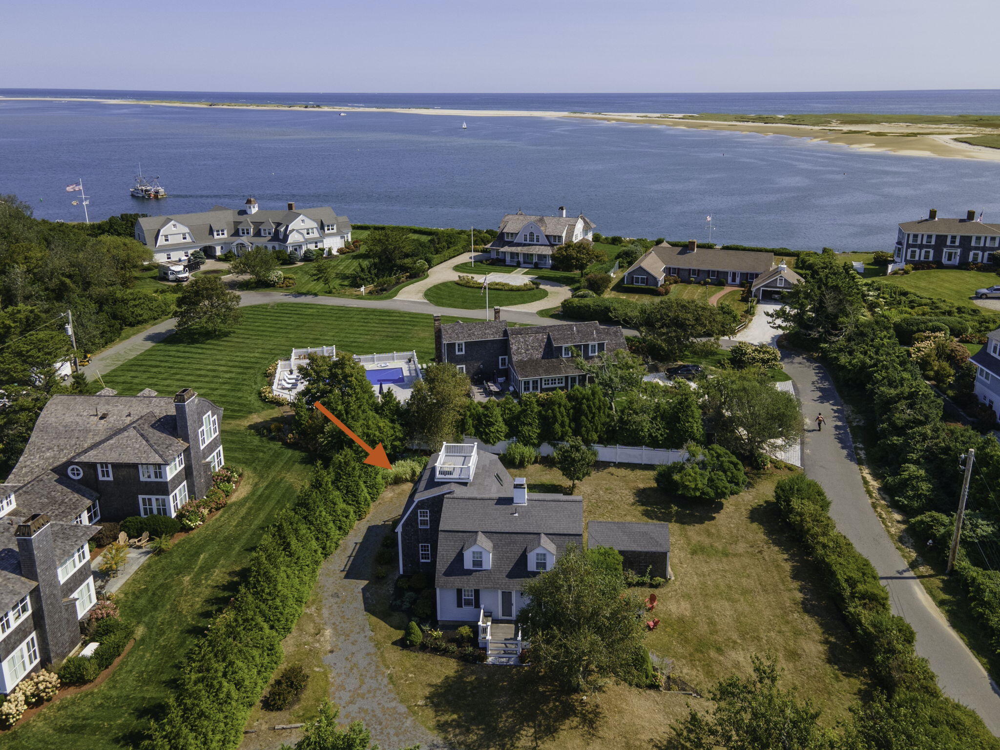 47 Quasson Road Chatham, MA 02633 - Photo 3 of 47 an aerial view of a houses with a lake view