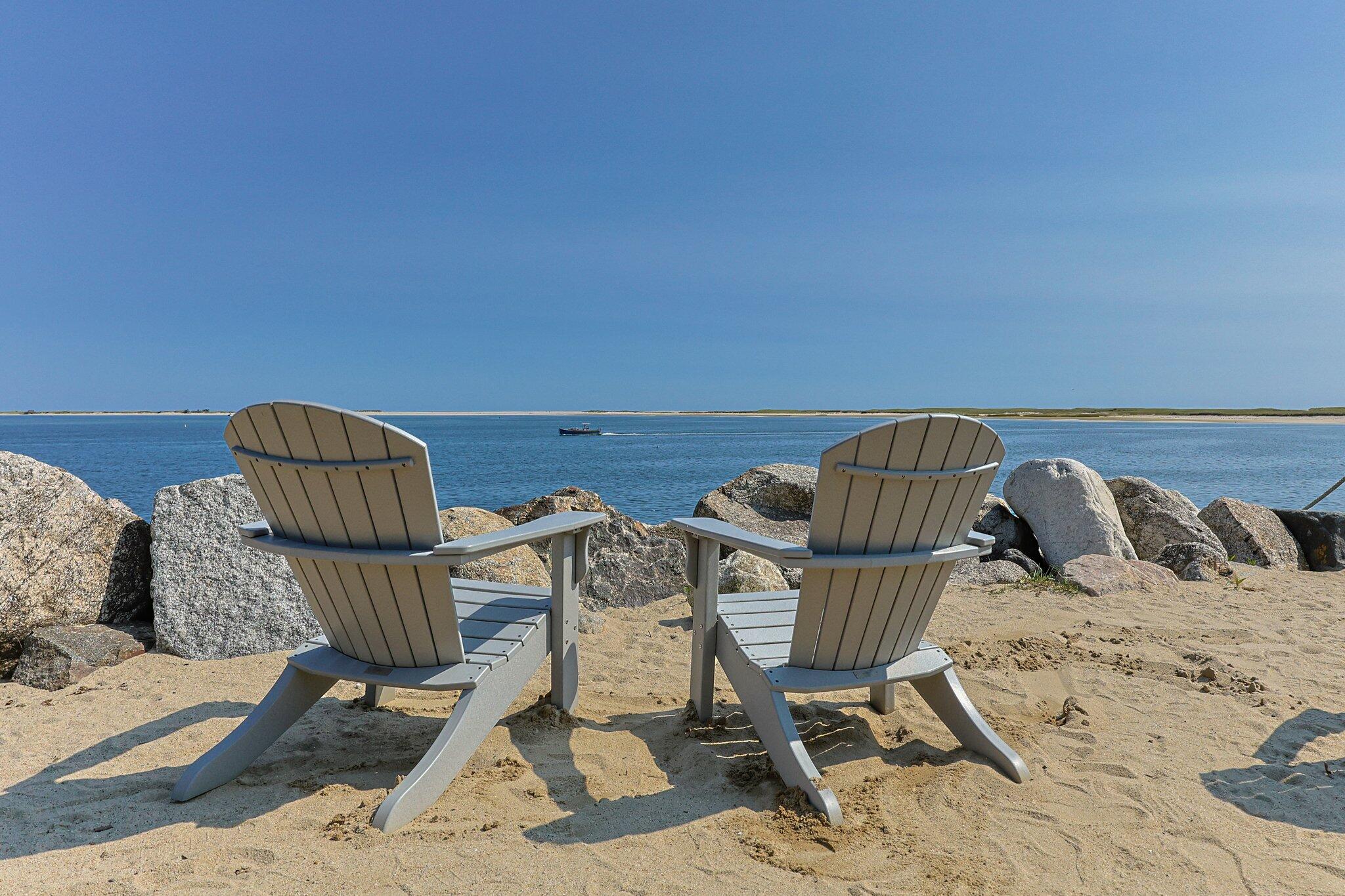 47 Quasson Road Chatham, MA 02633 - Photo 39 of 47 a view of a chairs and table in the ocean