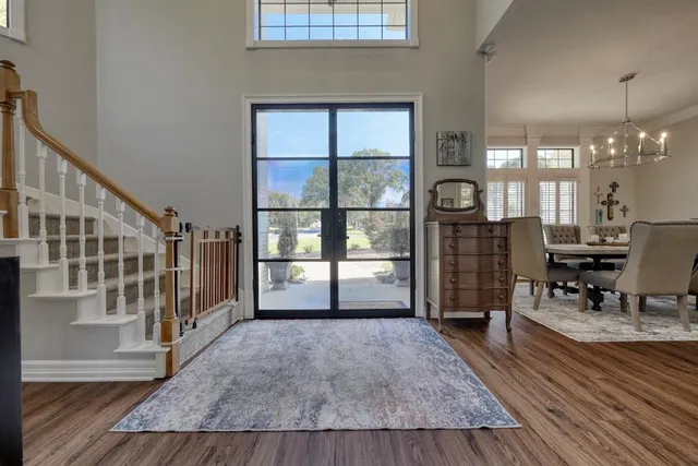a view of livingroom with furniture wooden floor and windows