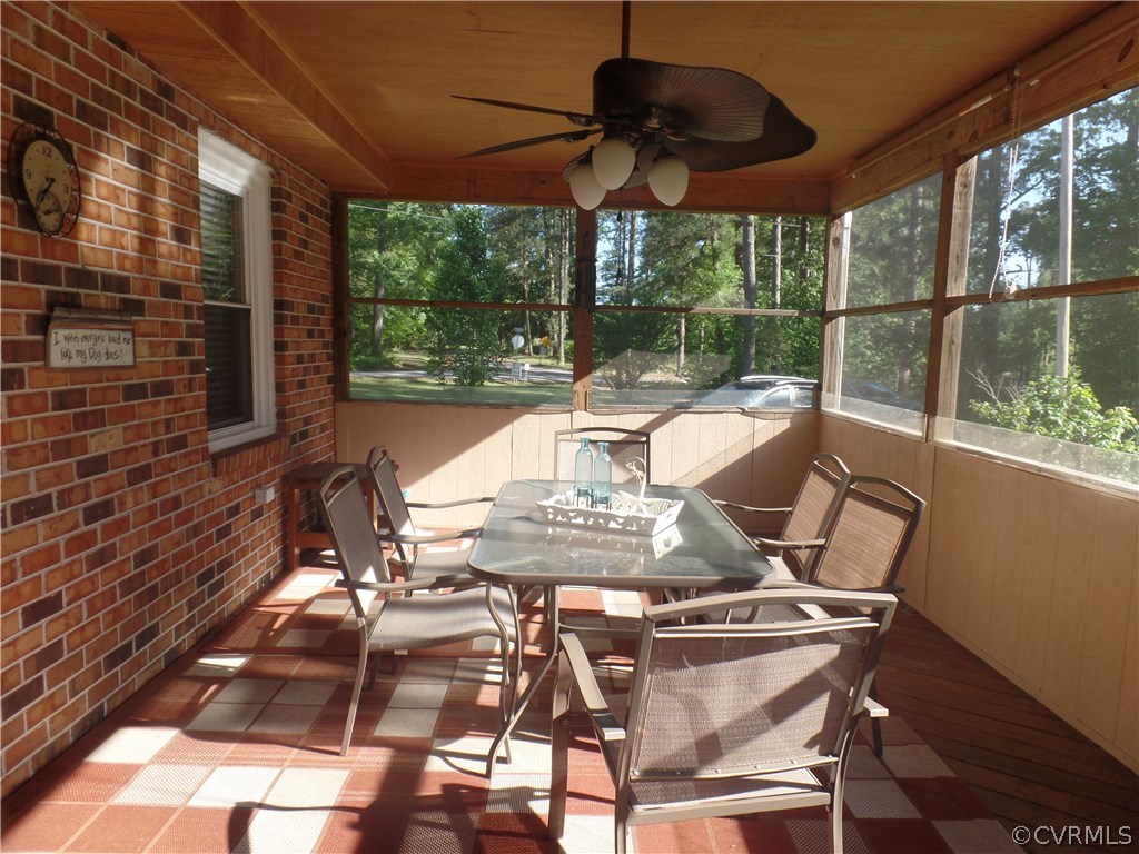 11108 Hitchcock Road Disputanta, VA 23842 - Photo 12 of 19 Screened-in Side Porch