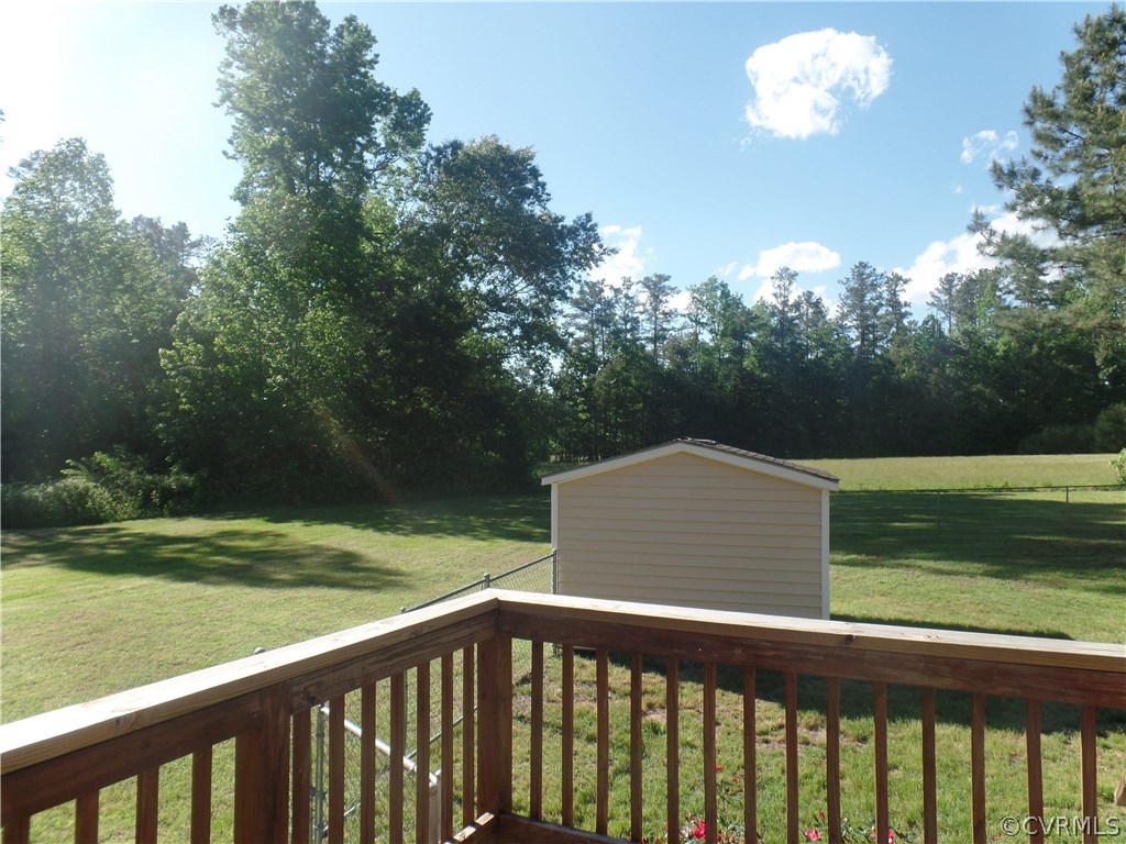11108 Hitchcock Road Disputanta, VA 23842 - Photo 13 of 19 Rear Deck, Storage Shed and Back Yard