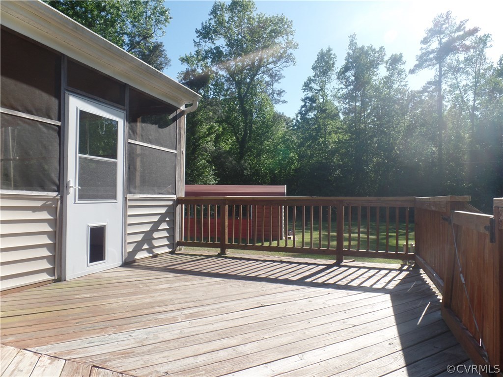 11108 Hitchcock Road Disputanta, VA 23842 - Photo 15 of 19 Large Rear Deck with Gate