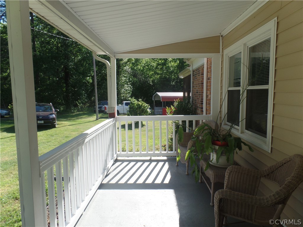 11108 Hitchcock Road Disputanta, VA 23842 - Photo 3 of 19 Concrete Front Porch with Vinyl Rails ... perfect