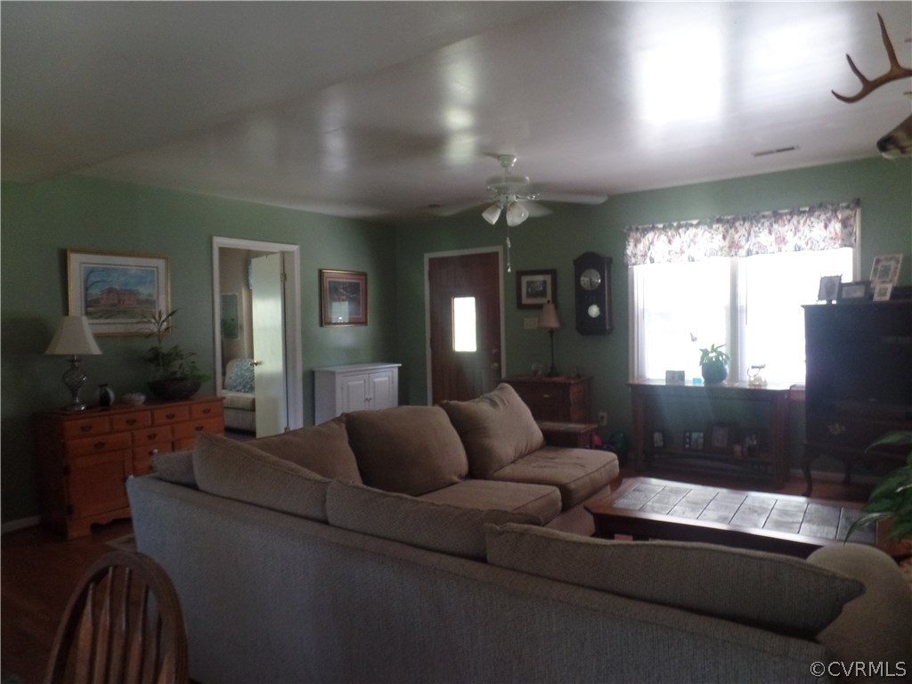 11108 Hitchcock Road Disputanta, VA 23842 - Photo 5 of 19 Large Family Room with Wood Floors and Ceiling Fan