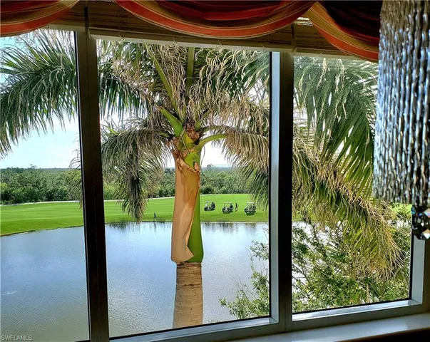 a view of swimming pool from a window