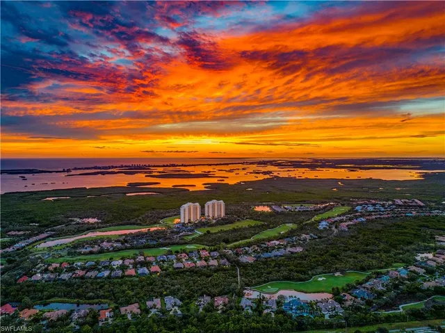 a view of a city with an ocean