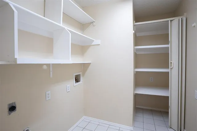 a view of an empty walk in closet